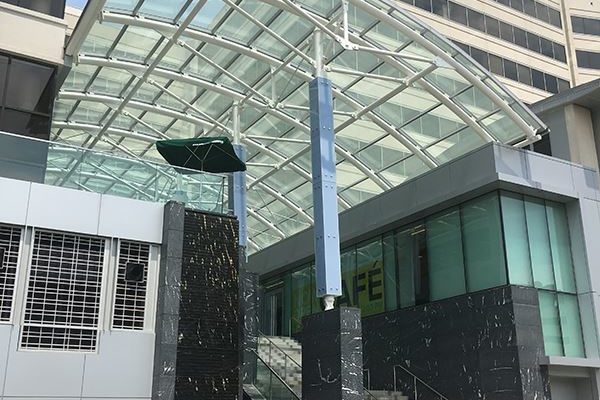 Cvent Building with cooling water feature. The canopy here provides little shade.