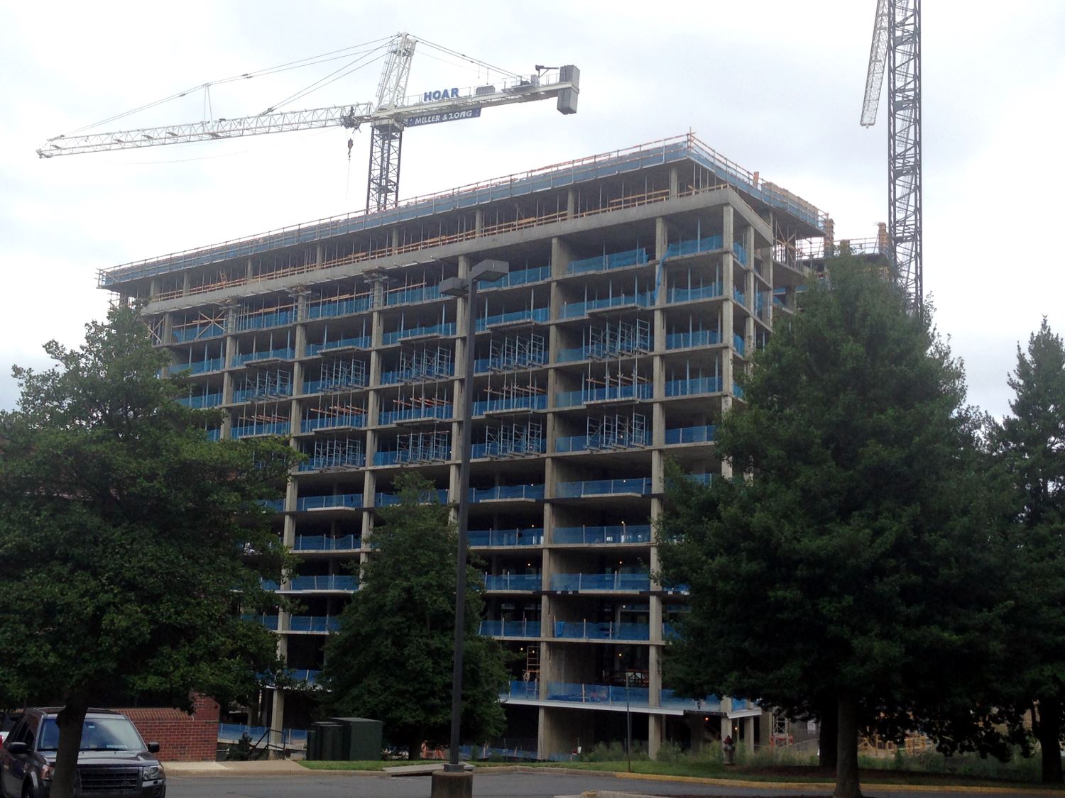 The Kingston at Anderson Park rising above Anderson Road in Tysons East